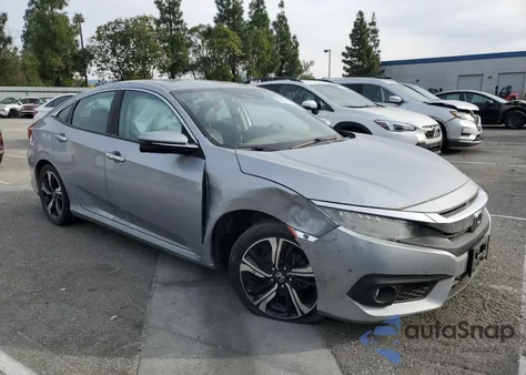 2016 Honda Civic Touring from USA, damaged, VIN 19XFC1F93GE209666